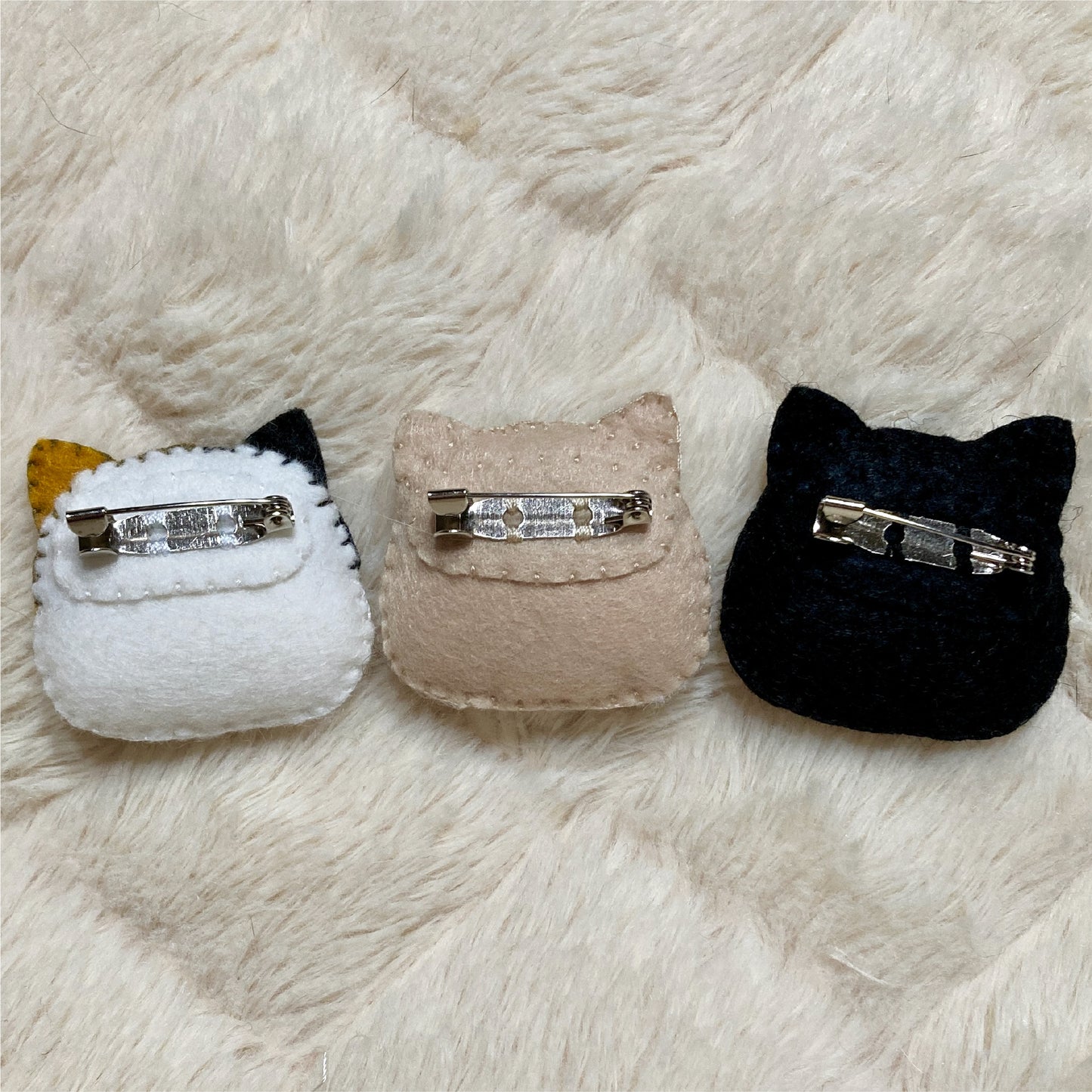 Face Brooch